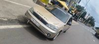 Bán xe Ford Laser 2003 GHIA 1.8 MT giá 65 Triệu - Bình Dương